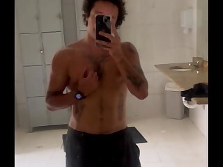 A Brazilian hunk flaunts his hairy, twitchy joy in the gym's public restroom after an intense workout. This horny FTM's solo performance will leave you breathless as he strokes his big clit.