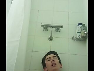 A steamy shower session turns into a sensual solo show as a teen guy indulges in self-pleasure. His youthful energy and raw desire culminate in an explosive climax, leaving him thoroughly satisfied.